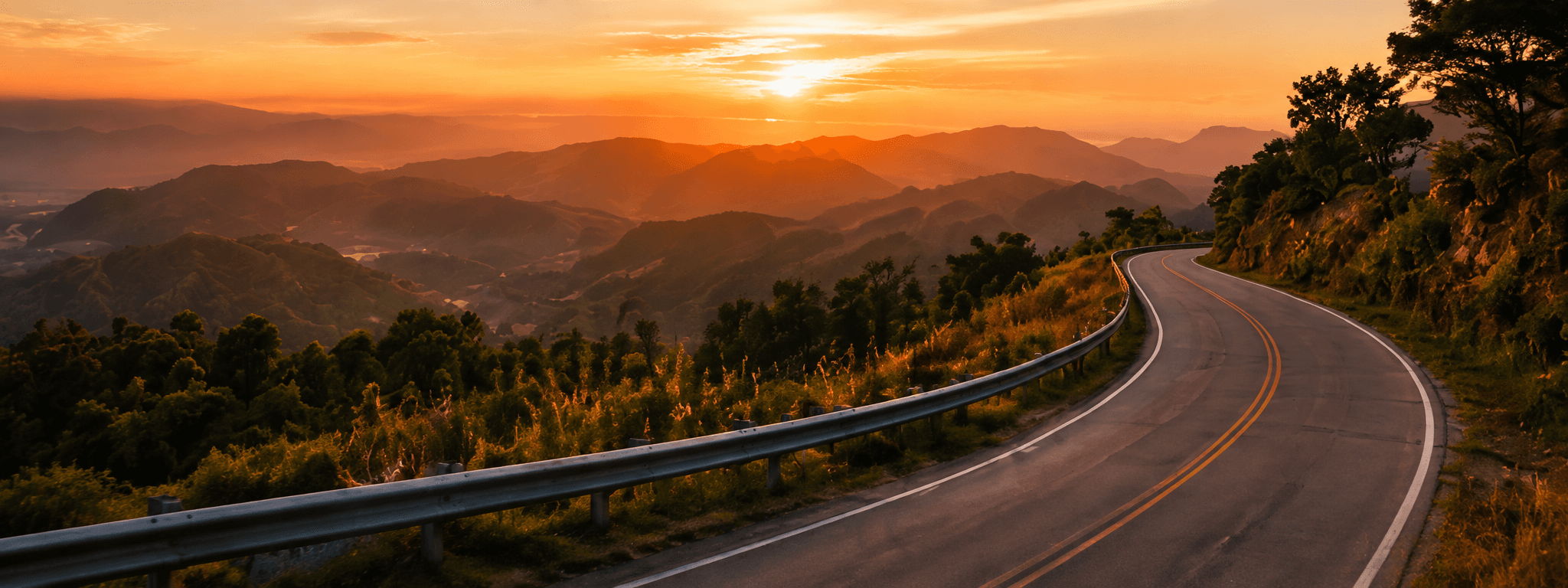 Winding mountain road at sunset in Northern Thailand